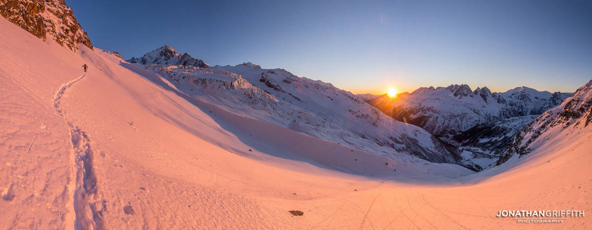 David tours in to the Albert Premier Hut at sunset
