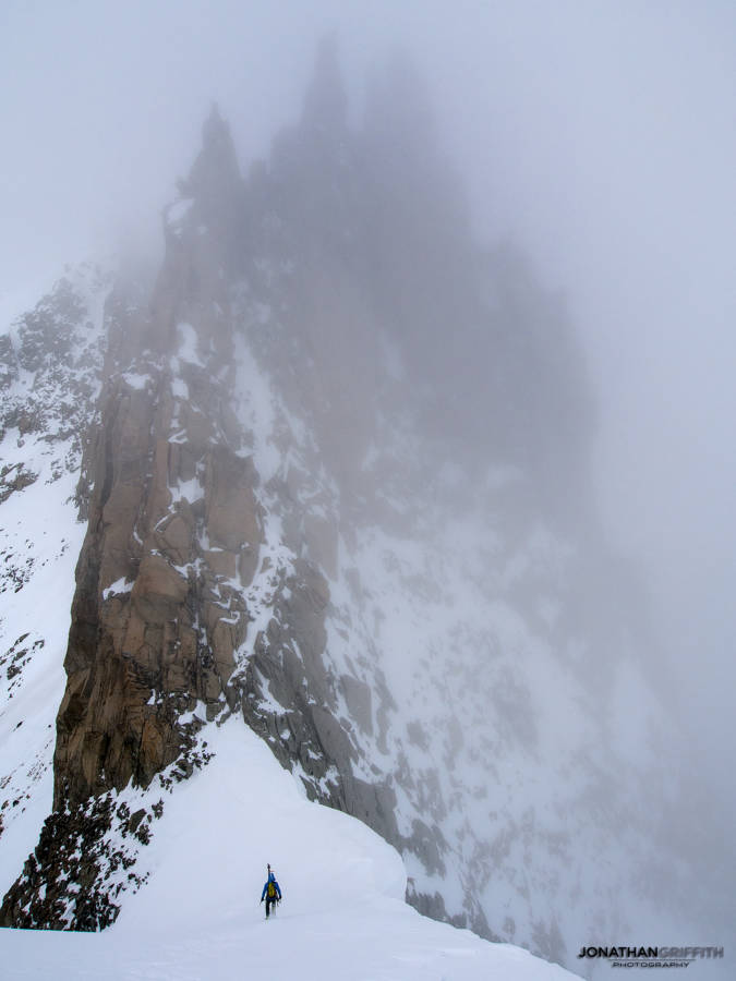 Andy tops out of the Courtes as the bad weather rolls in