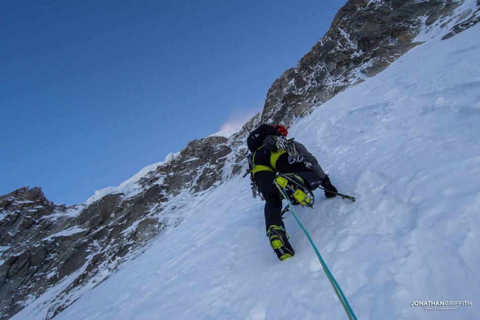 Climbing out of the fall zone of the seracs above