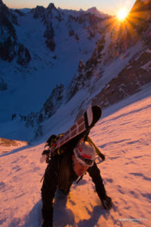 Two skiers on the Couturier at sunrise