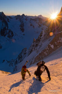 Two skiers on the Couturier at sunrise