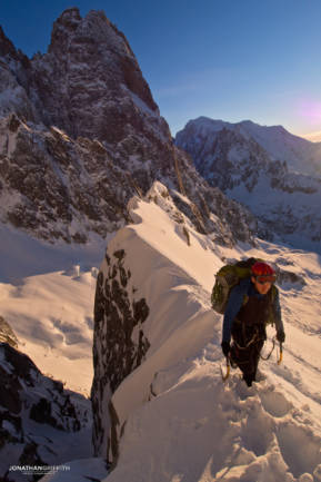 Heading in to the Sans Nom as the sun sets over Mont Blanc and the Drus