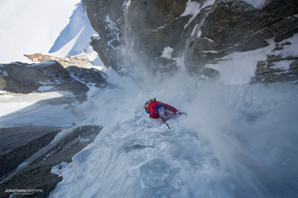 Steph taking the spindrift on the last pitch of Supercouloir