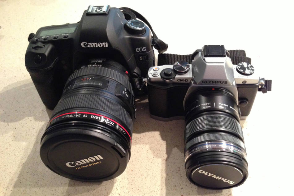 A side by side of the EM-5 and 5D,you can see why I prefer the EM5 for light and fast missions © http://rboyle.co.uk