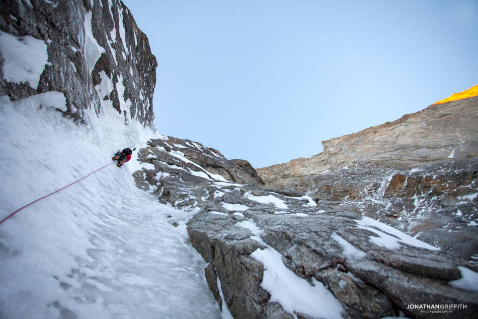 Will in the first gully as the sun hits the Manitua headwall