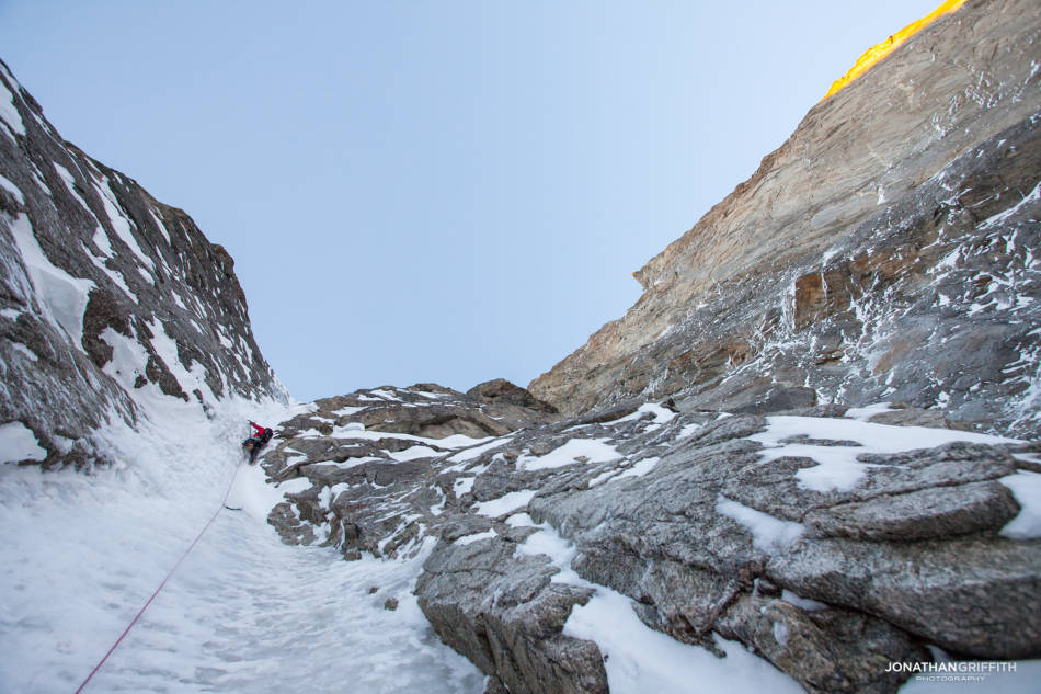 Will in the first gully as the sun hits the Manitua headwall