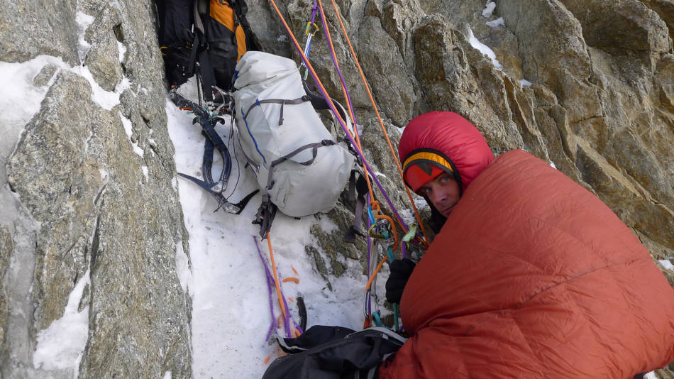 Bivy kit has many uses- it's also a great crash mat from falling rocks when belaying, © Ally Swinton