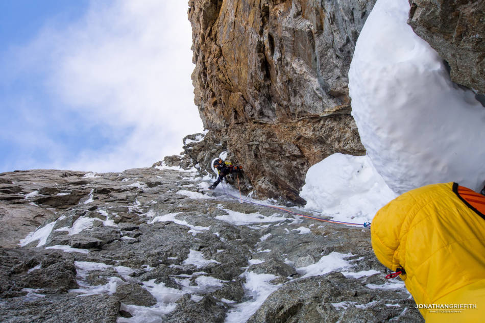 Silver tries to aid his way up rotten rock before the gear rips as does he...